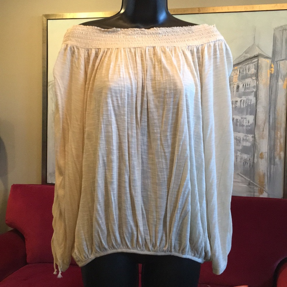 Off the shoulder, open back, peasant knit top.